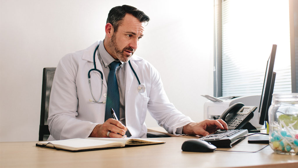 doctor on computer