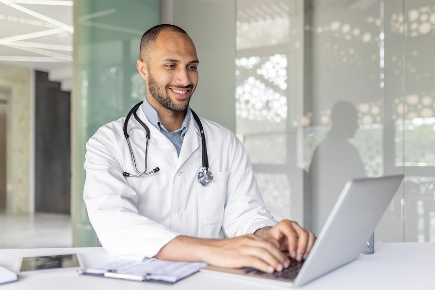 doctor working on his laptop
