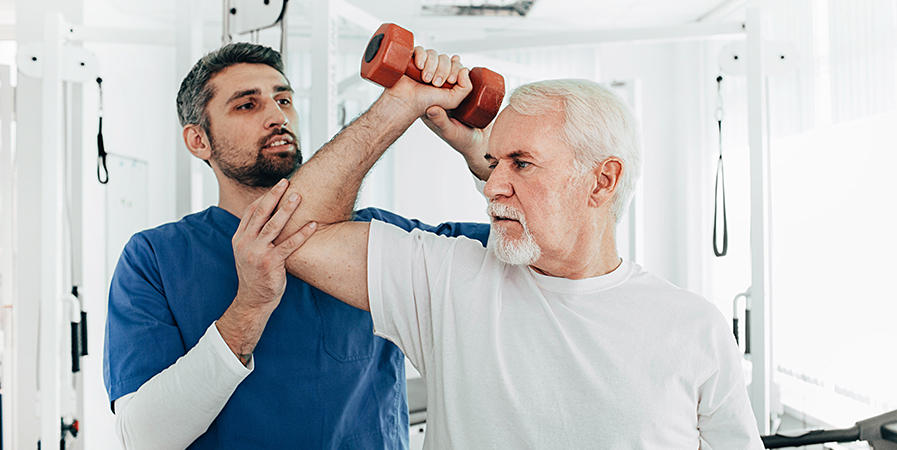 therapist and patient exercising